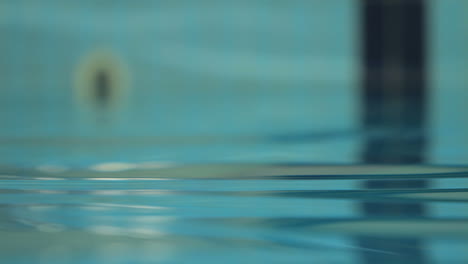 Water-surface-in-swimming-pool.-Water-background
